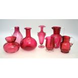 Victorian cranberry glass comprising a decanter and stopper, pot and cover,