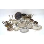 A quantity of electroplated wares, including a pair of classical column candlesticks,