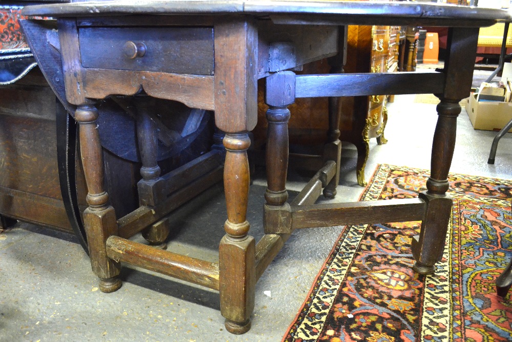 A 17th century oak gateleg table, the pl - Image 5 of 10