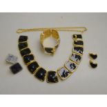 Monet - a matching black enamelled neckl