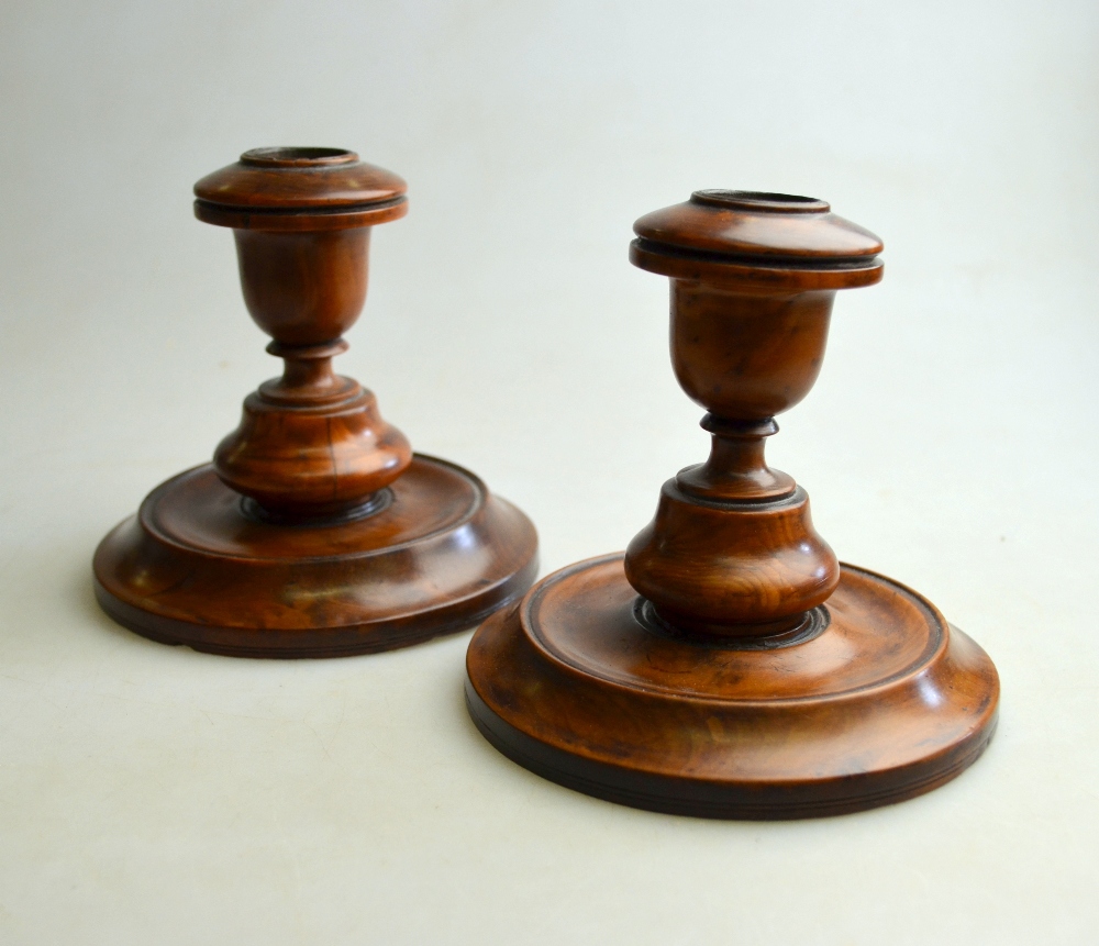 A pair of 19th century turned fruitwood