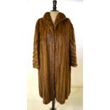 A mid-brown shadowed mink coat with neat