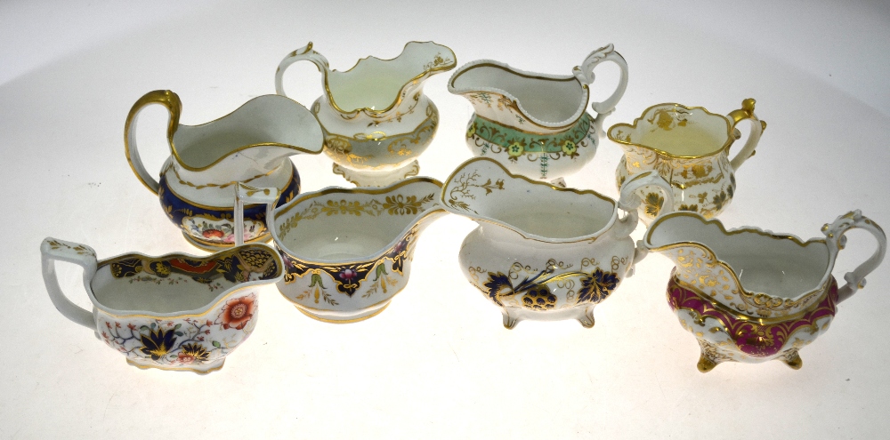 Eight assorted mid 19th century creamers