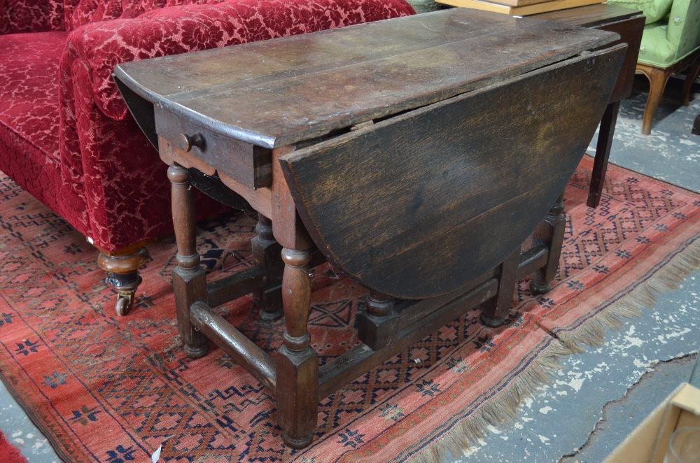 A 17th century oak gateleg table, the pl - Image 7 of 10