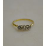 A three-stone old cut diamond ring 18ct