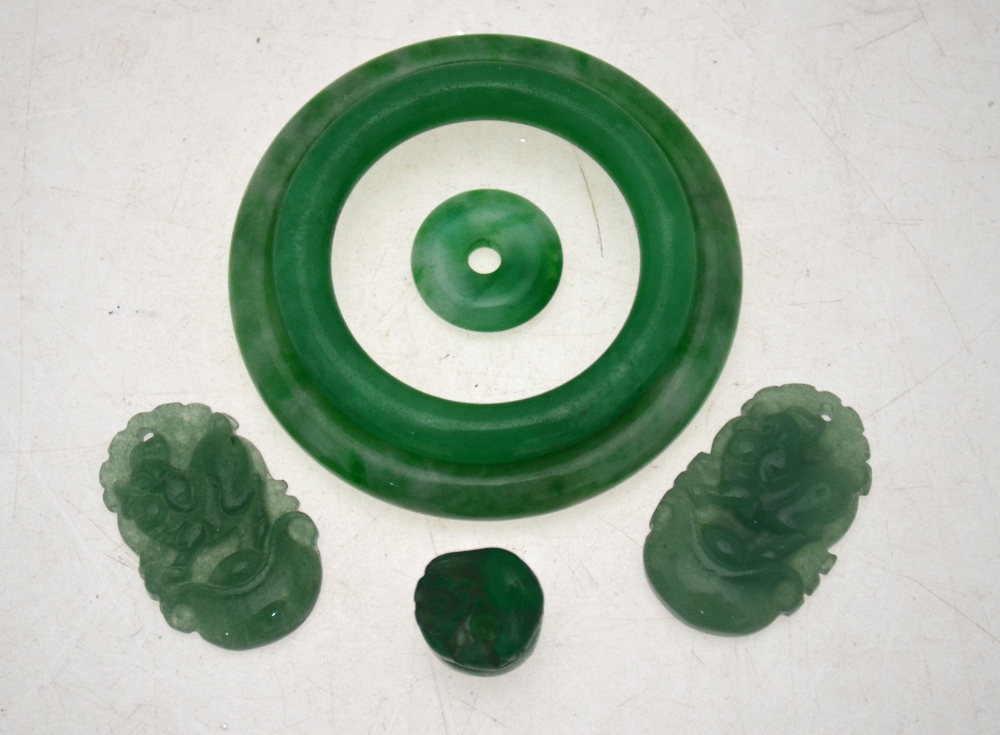 Six Chinese green stone objects, compris