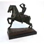 A brown patinated bronze equestrian grou