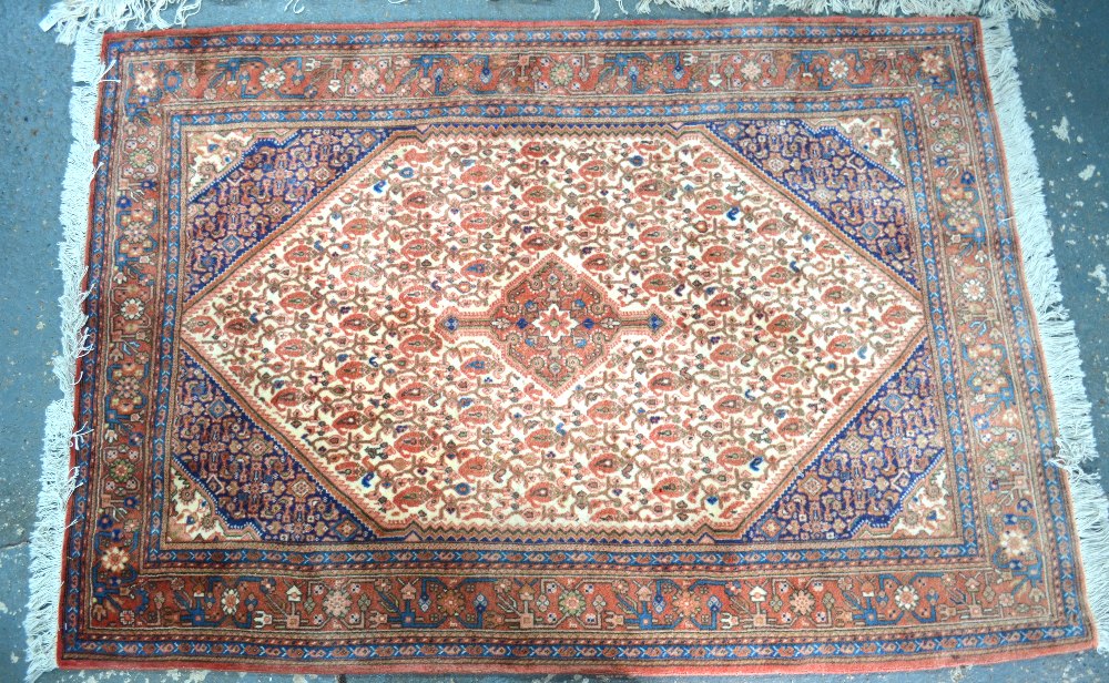 A Persian Qashqai rug, the central reser