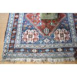 A Persian Qashqai rug, garden design on