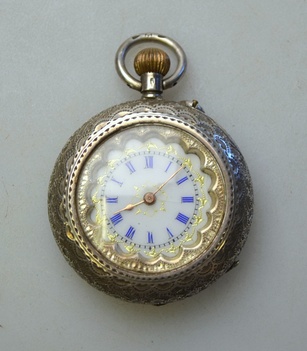 A lady's Swiss 935 standard fob watch with engraved case,