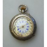 A lady's Swiss 935 standard fob watch with engraved case,