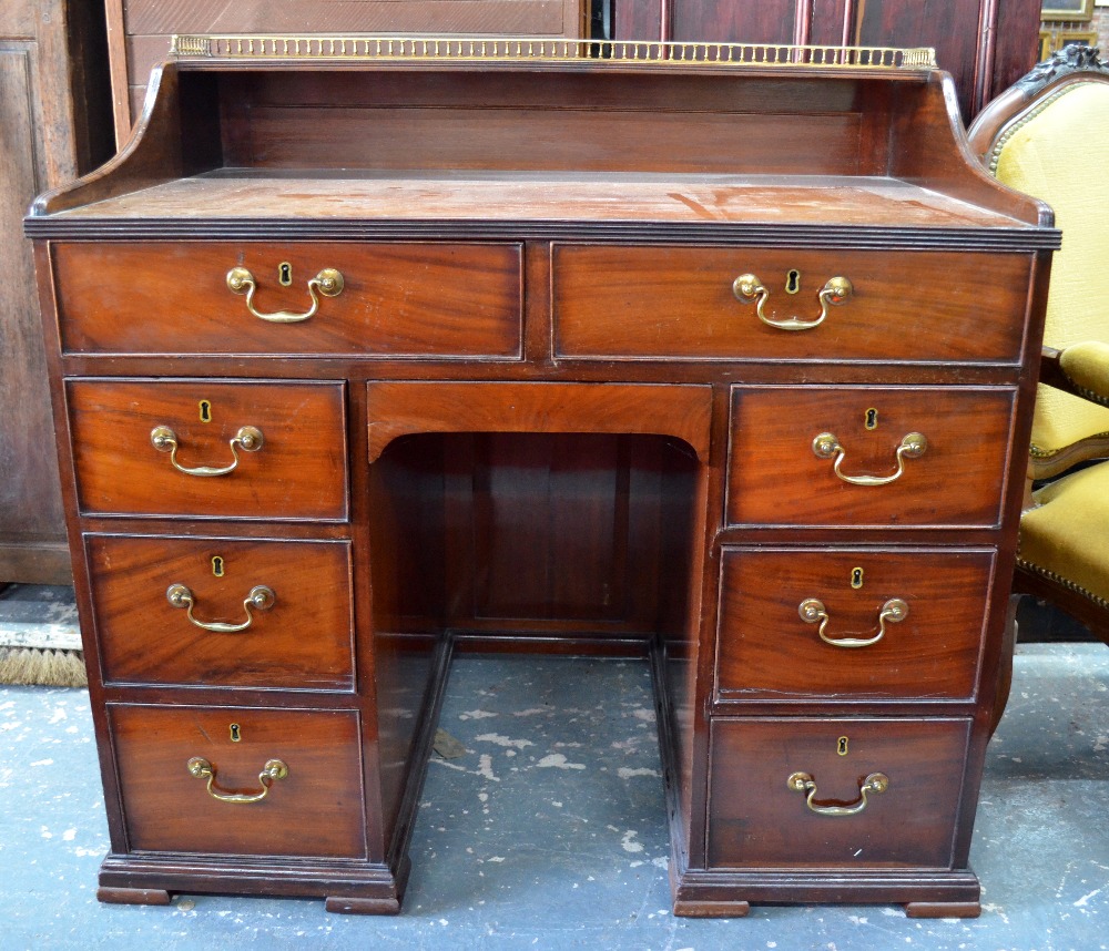 A 19th century mahogany galleried top kn
