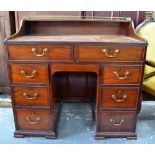 A 19th century mahogany galleried top kn