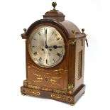 An oversize brass inlaid walnut dome cas