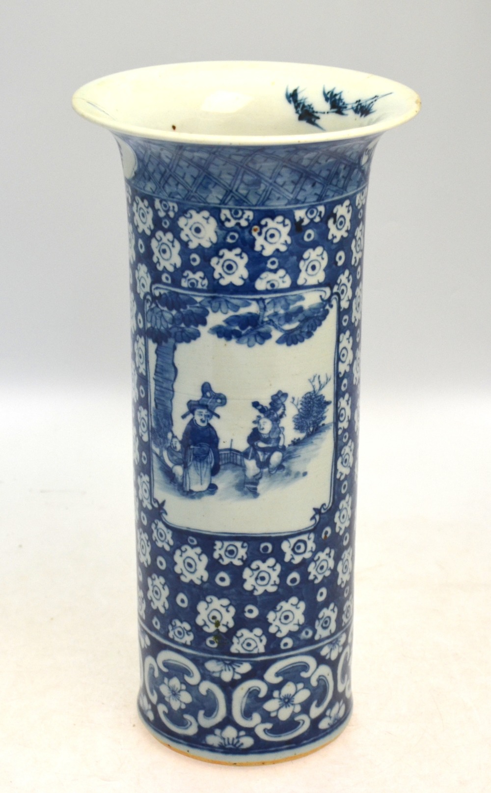 A blue and white cylindrical vase, decor