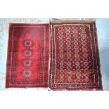 Two old Afghan Turkoman design rugs, bro