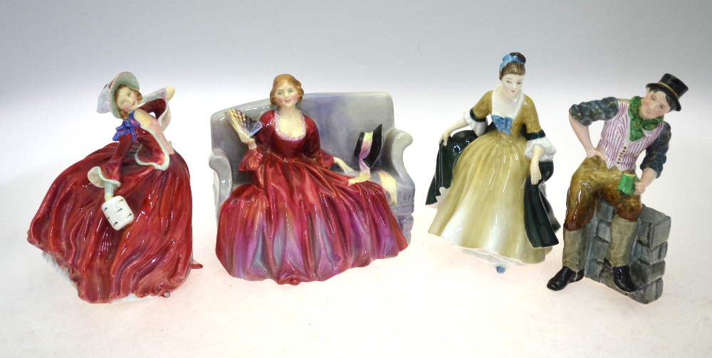 A Staffordshire figure and three Royal D