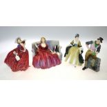 A Staffordshire figure and three Royal D