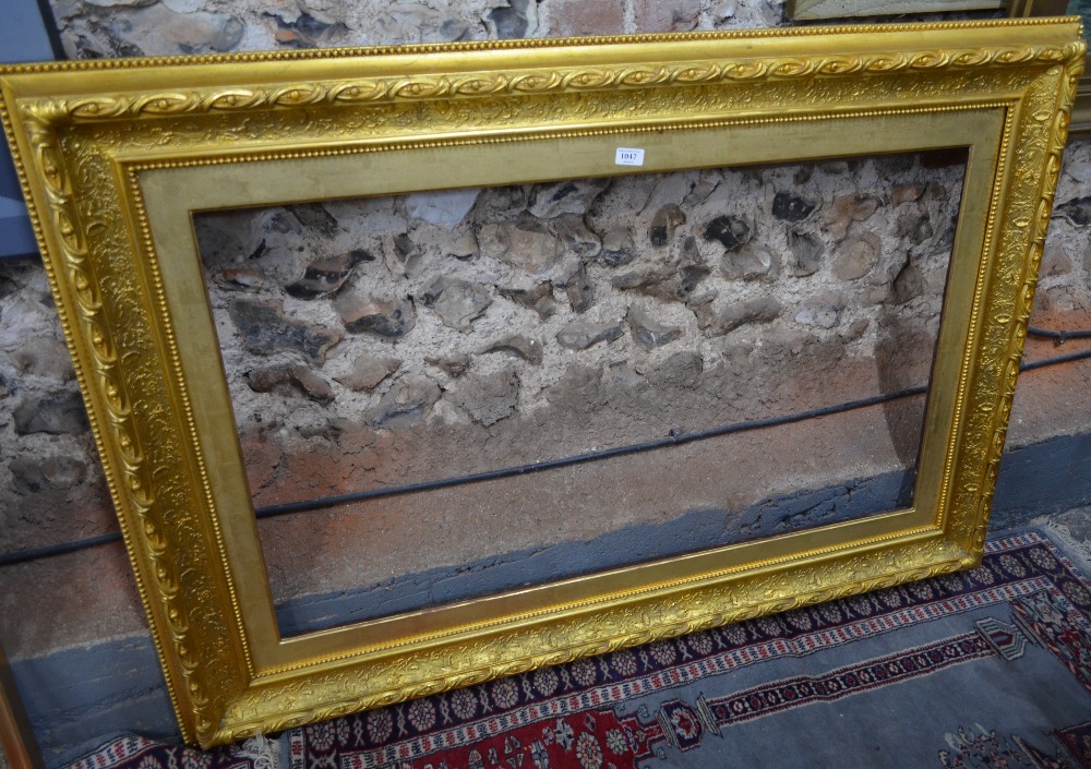 An antique rectangular giltwood picture