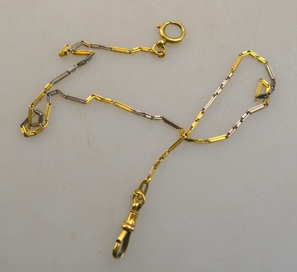 An 18ct two-colour gold fine watch chain with alternate long and short block links,