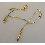 An 18ct two-colour gold fine watch chain with alternate long and short block links,