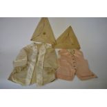 A vintage cream silk satin page's outfit,