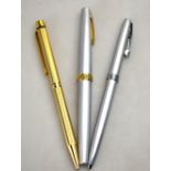 A Sheaffer 630 fountain pen, the brushed steel body with engraved gilt band, 14k nib,