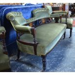 A late 19th inlaid rosewood three piece salon suite having green overstuffed seats,
