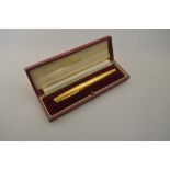 An 18ct yellow gold engine turned Parker fountain pen in fitted box,
