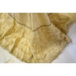 A Victorian ivory silk floral damascene brocade skirt with short train,