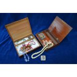A box containing modern and vintage costume jewellery