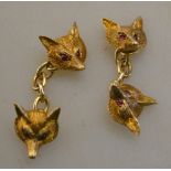 A pair of 9ct fox mask cufflinks having garnet set eyes approx 9g Condition Report
