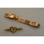 A rose coloured metal fancy gate style bracelet stamped 9C to/w an opal and garnet bar brooch,