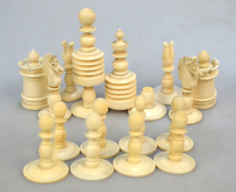 A 19th century ring-turned bone chess set with red dye, king 9. - Image 3 of 4