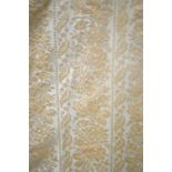 A Victorian pale eau de nil damascene brocade skirt with ivory silk floral sprays,