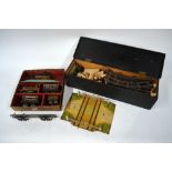 A quantity of Hornby O gauge clockwork train set, including locomotive,