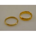 A 22ct wedding band approx 6g and an 18ct wedding band approx 3.