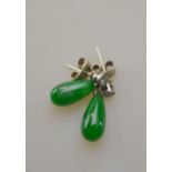 A pair of diamond and jade drop earrings for pierced ears,