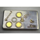 An interesting German cigarette case, the cover set with an 1899 half sovereign, .