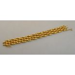 An 18ct yellow gold gate style bracelet approx 27g