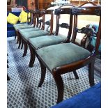 A set of six Regency moulded bar back dining side chairs with carved horizontal splats over green