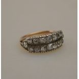 An antique two-row diamond cluster ring,