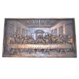 A relief-cast bronze plaque of Da Vinci's Last Supper, with Latin inscription beneath,