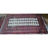 An old Persian Turkoman rug, camel ground within multi borders, 1.75 x 1.