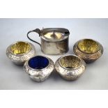 A set of four Victorian silver small open salts with engraved decoration, James Deakin & Sons,