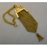 A 9ct gold mesh evening bag, with pierced foliate clasp inset with cabochon sapphire,