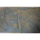 A 19th century Brussels ivory lace veil with profuse floral and foliate sprays to edge and smaller