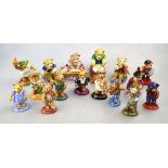 Sixteen Halcyon Days porcelain models of Teddy Bears comprising three Lords and a Lady playing