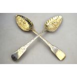 A pair of early 19th century foreign white metal berry spoon,
