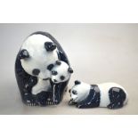 Two Royal Copenhagen models - Panda with cubs, no. 666 and Panda sleeping, no.